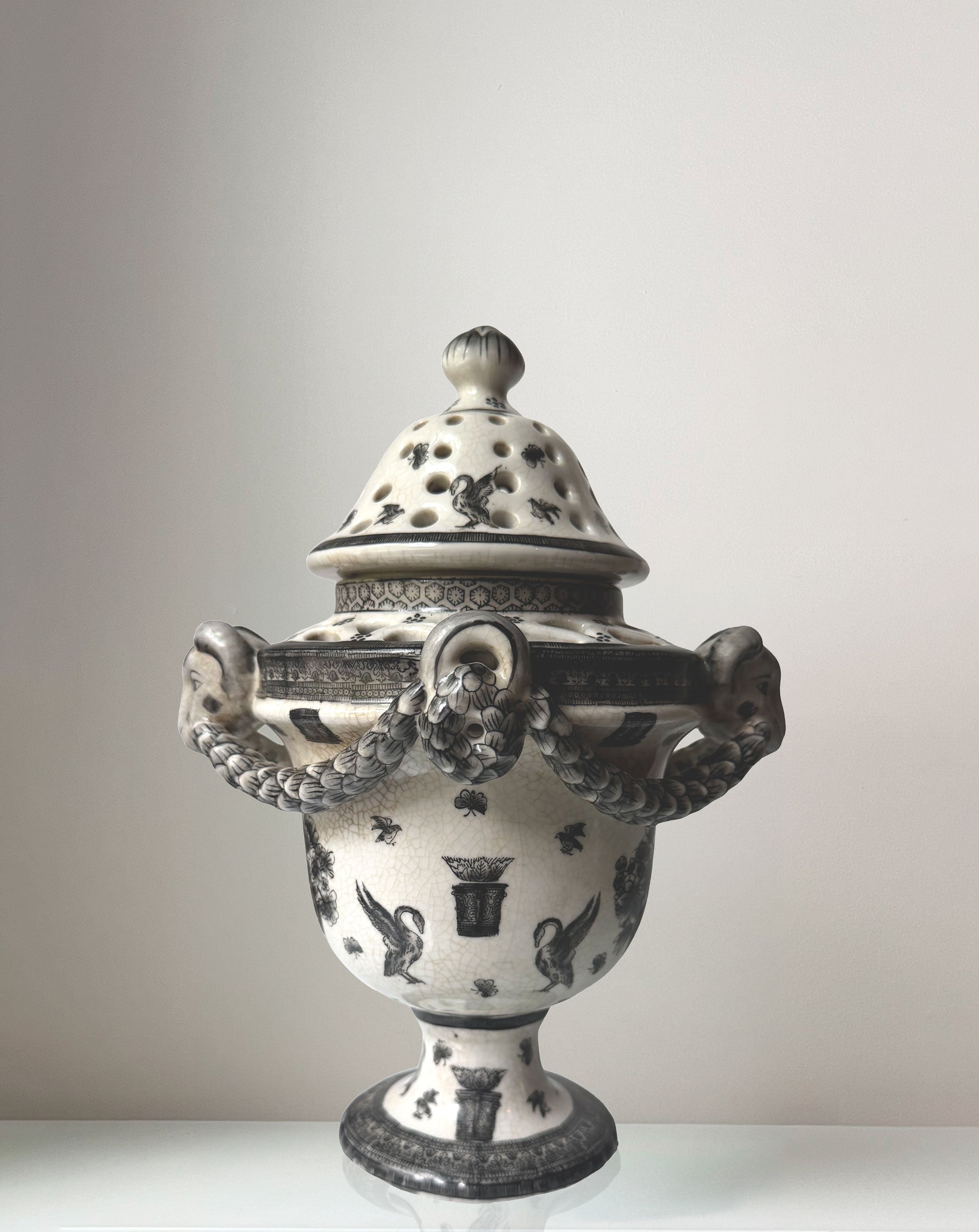 Pierced Rams Head Jar