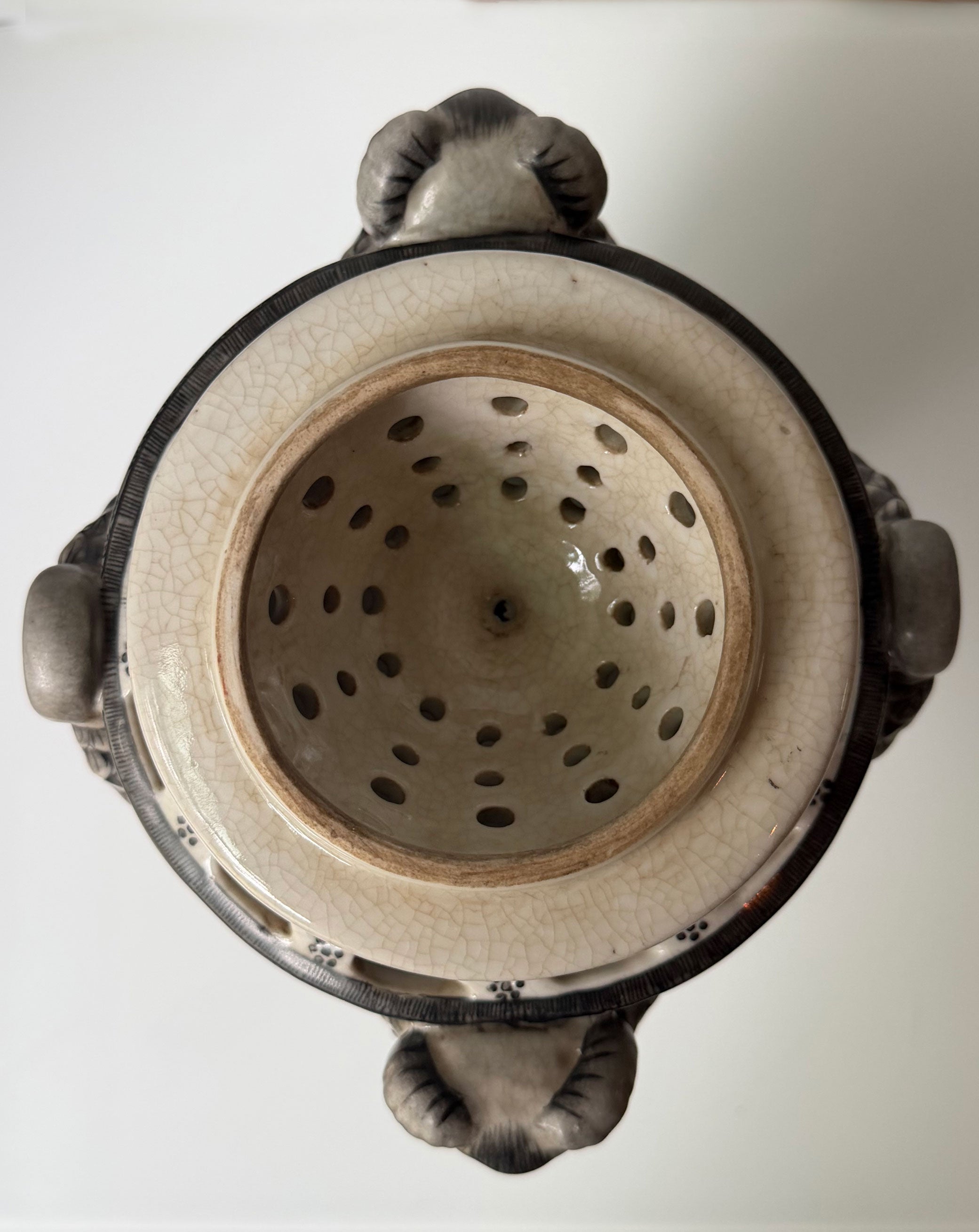 Pierced Rams Head Jar