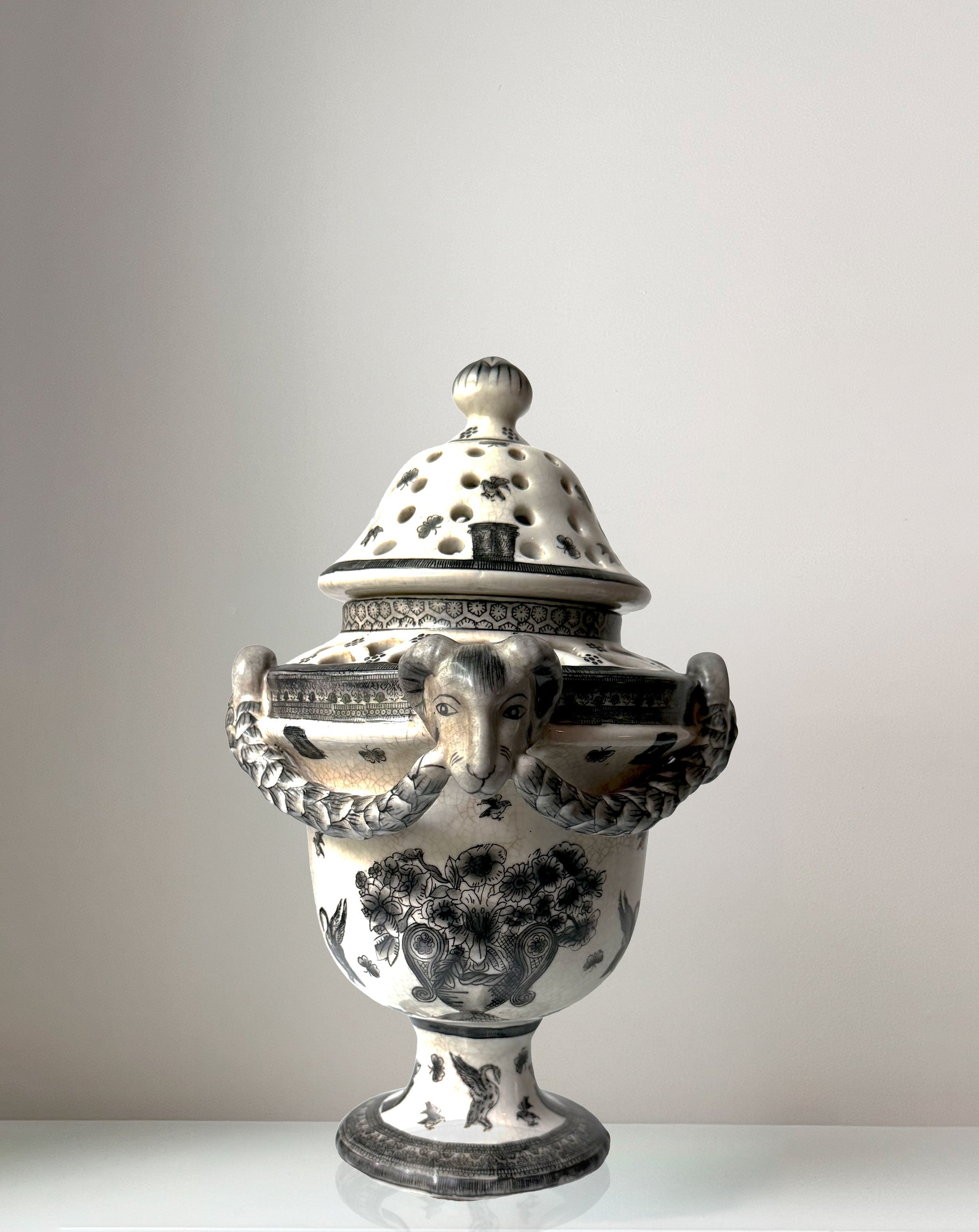 Pierced Rams Head Jar