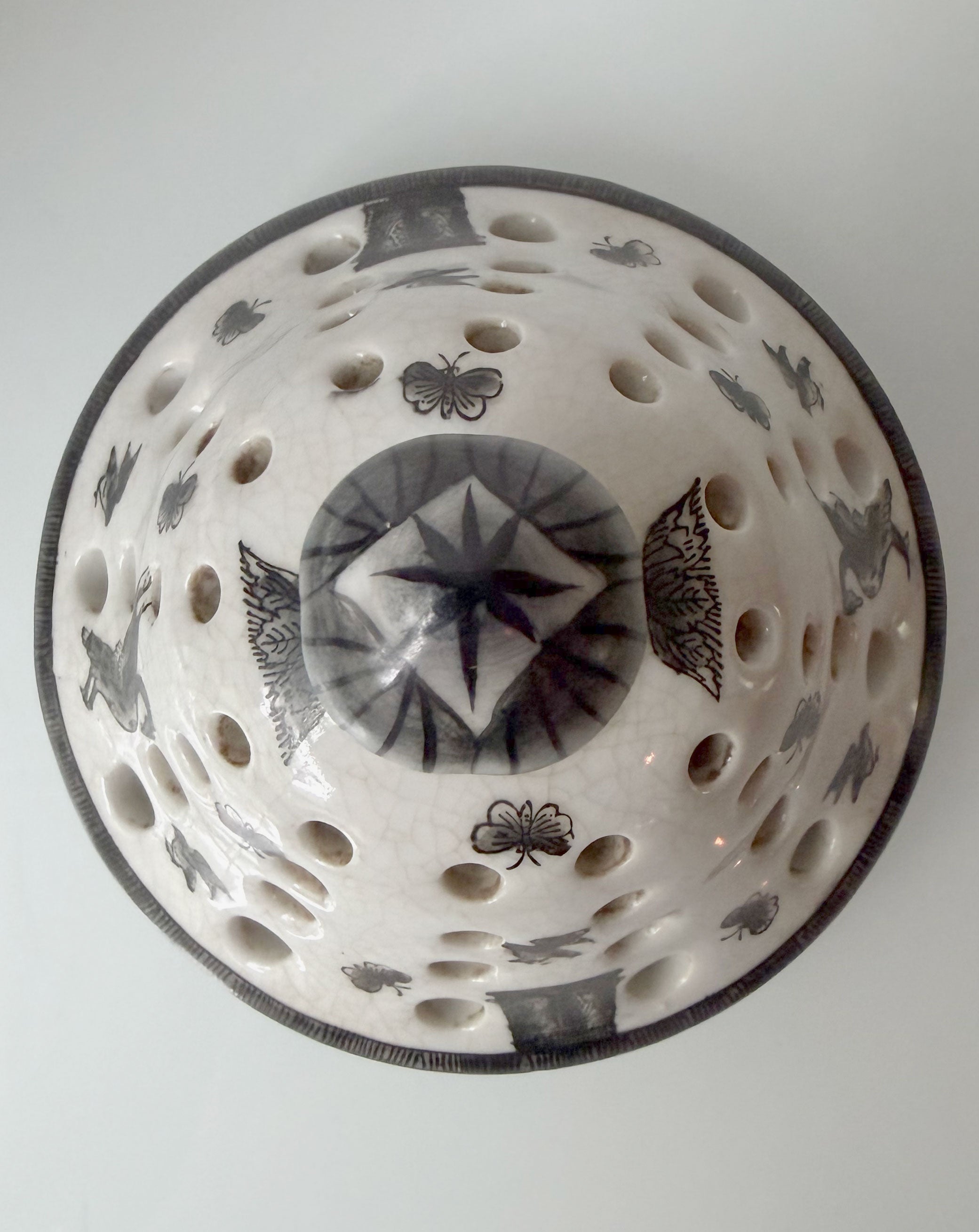 Pierced Rams Head Jar